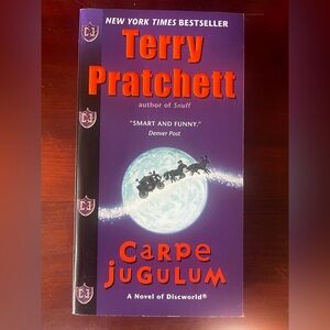 Carpe Jugulum and Monstrous Regiment by Terry Pratchett